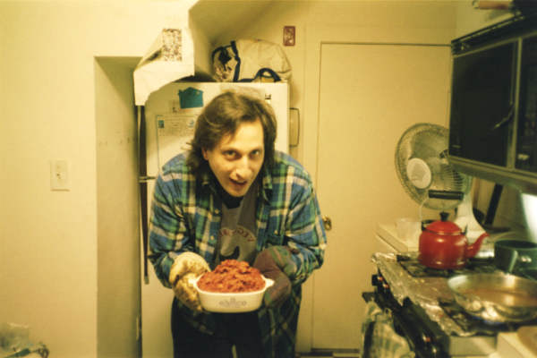 [Robert holding a cooked product]